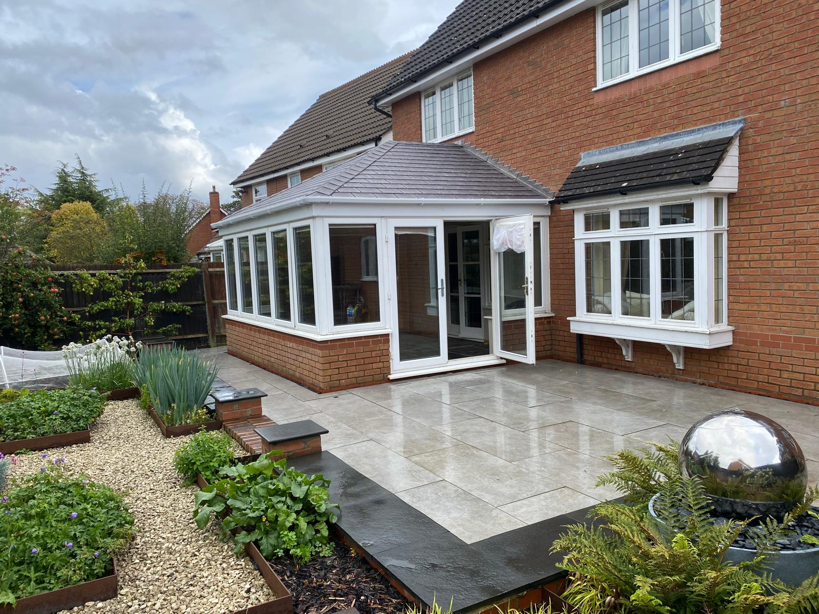 Single conservatory with finished garden