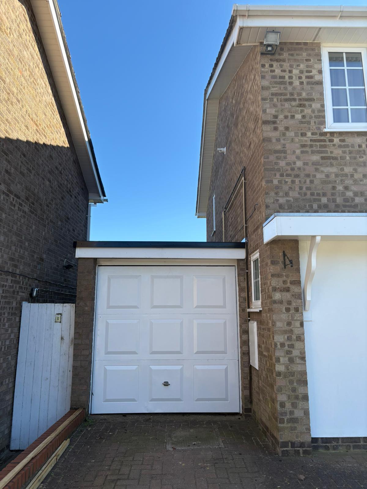 Single garage flat roof above view
